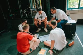 Pastors in discussion during a workshop activity