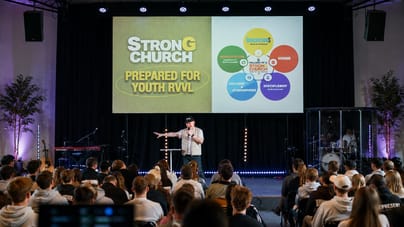 Large audience gathered for a church leadership session